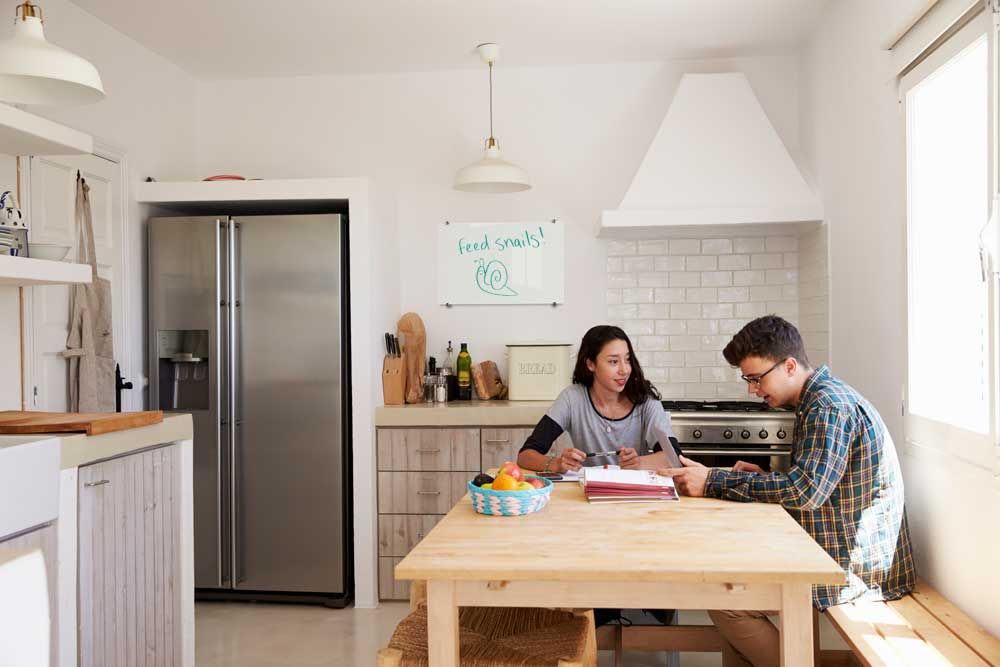glass dry erase board in a home kitchen